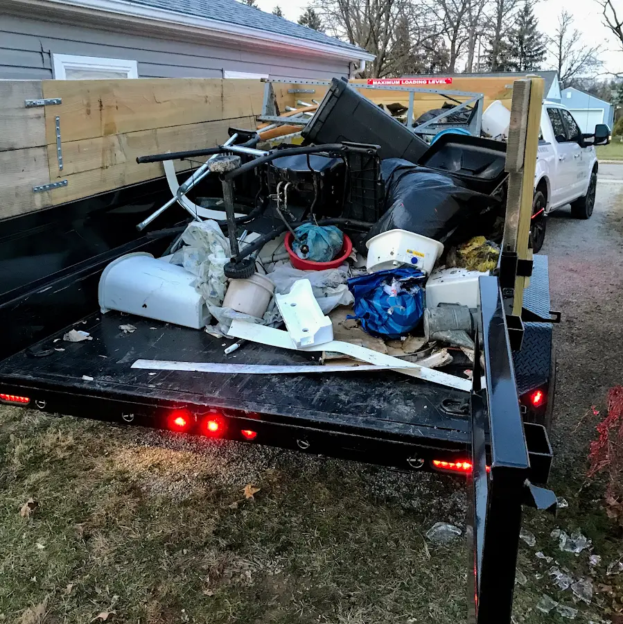 Roll-off dumpster delivered to a residential driveway in Williams